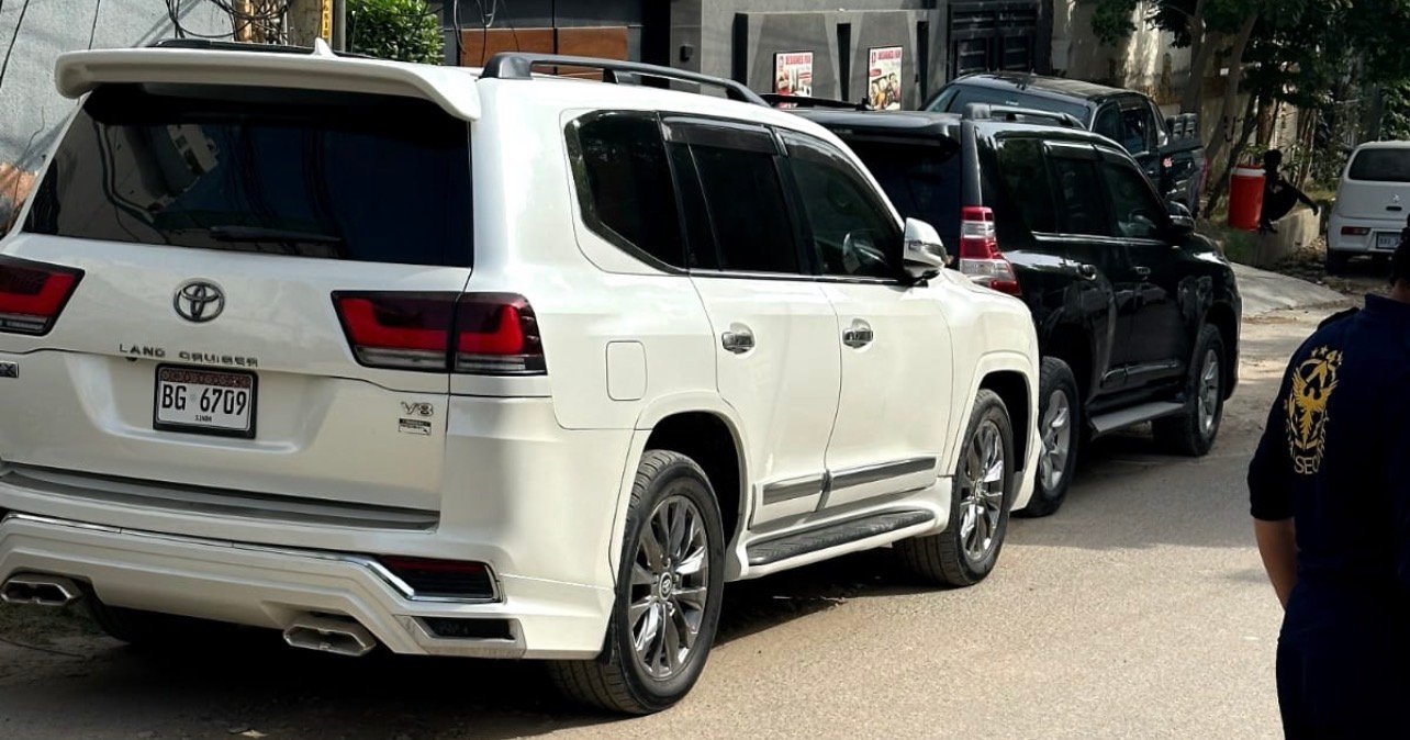 Fleet of black and white Toyota Land Cruiser V8 models ready to rent Land Cruiser Karachi