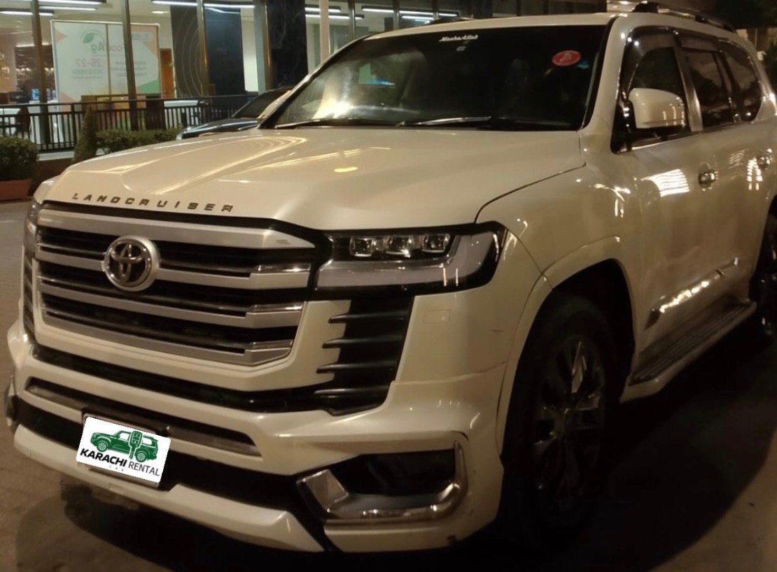 Pearl white Land Cruiser LC300 V8 luxury car rental for airport transfer rent Land Cruiser Karachi